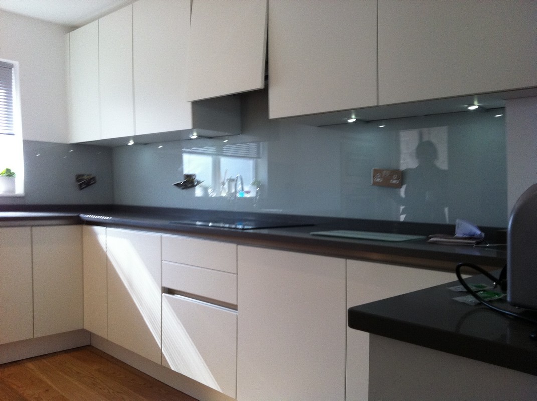 Grey glass kitchen splashback with LED lighting in Southgate