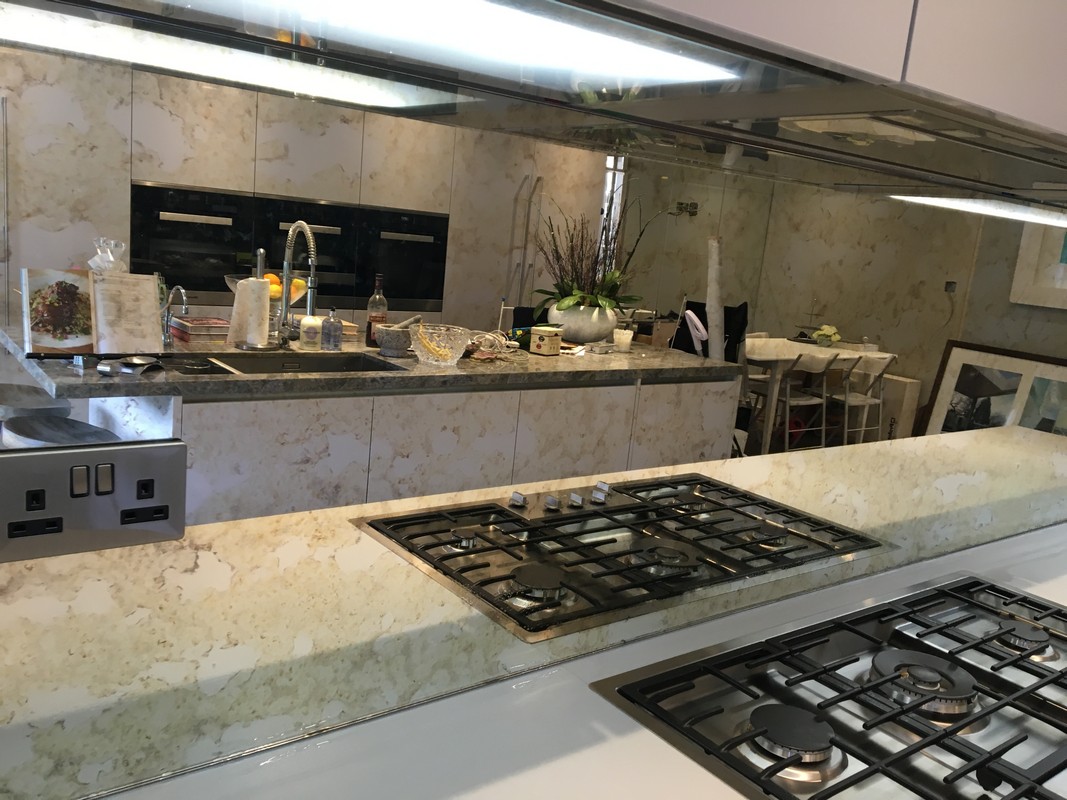 Mirror glass splashback in Southgate luxury kitchen
